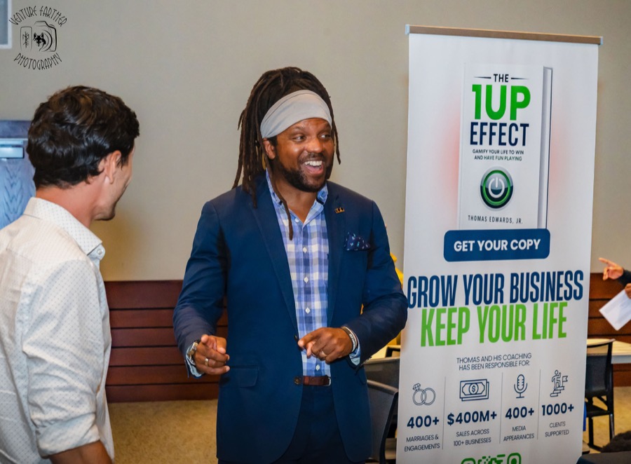 Thomas Edwards connecting with a guest at a business event